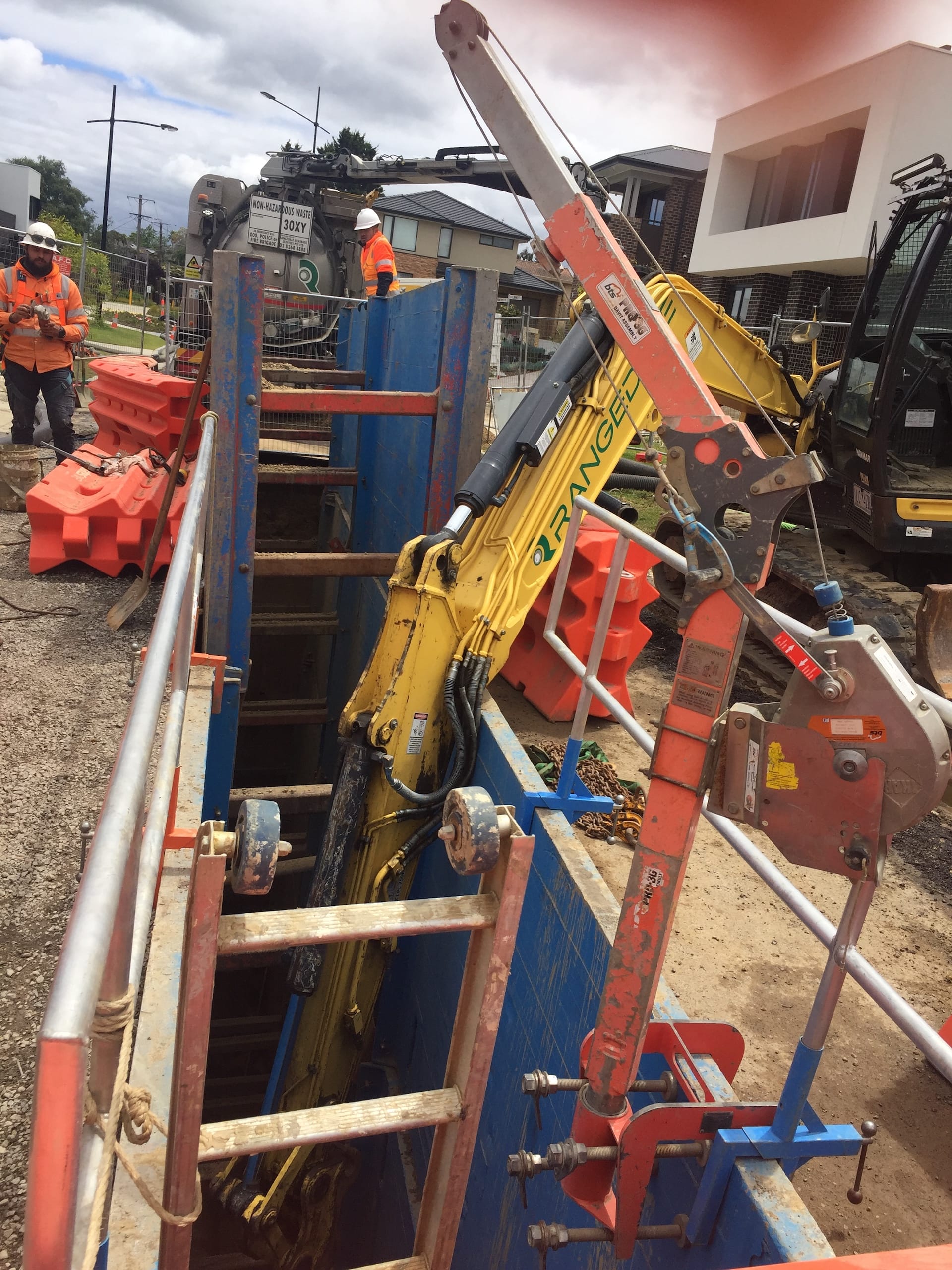 Lightweight trench box Ultra Shields in excavation supporting trench walls with safe working clearance