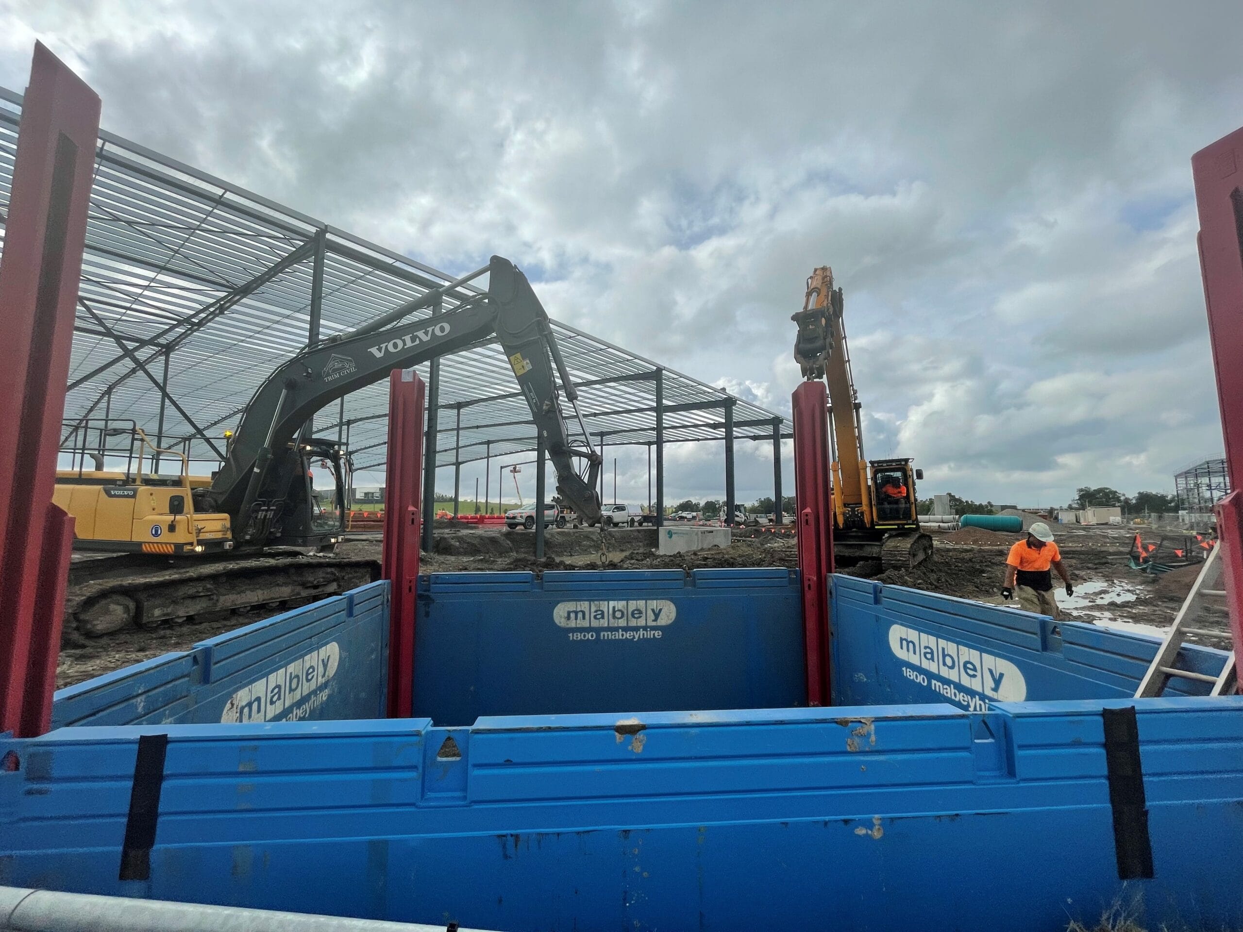 Mabey trench shoring shield securing excavation walls during construction project
