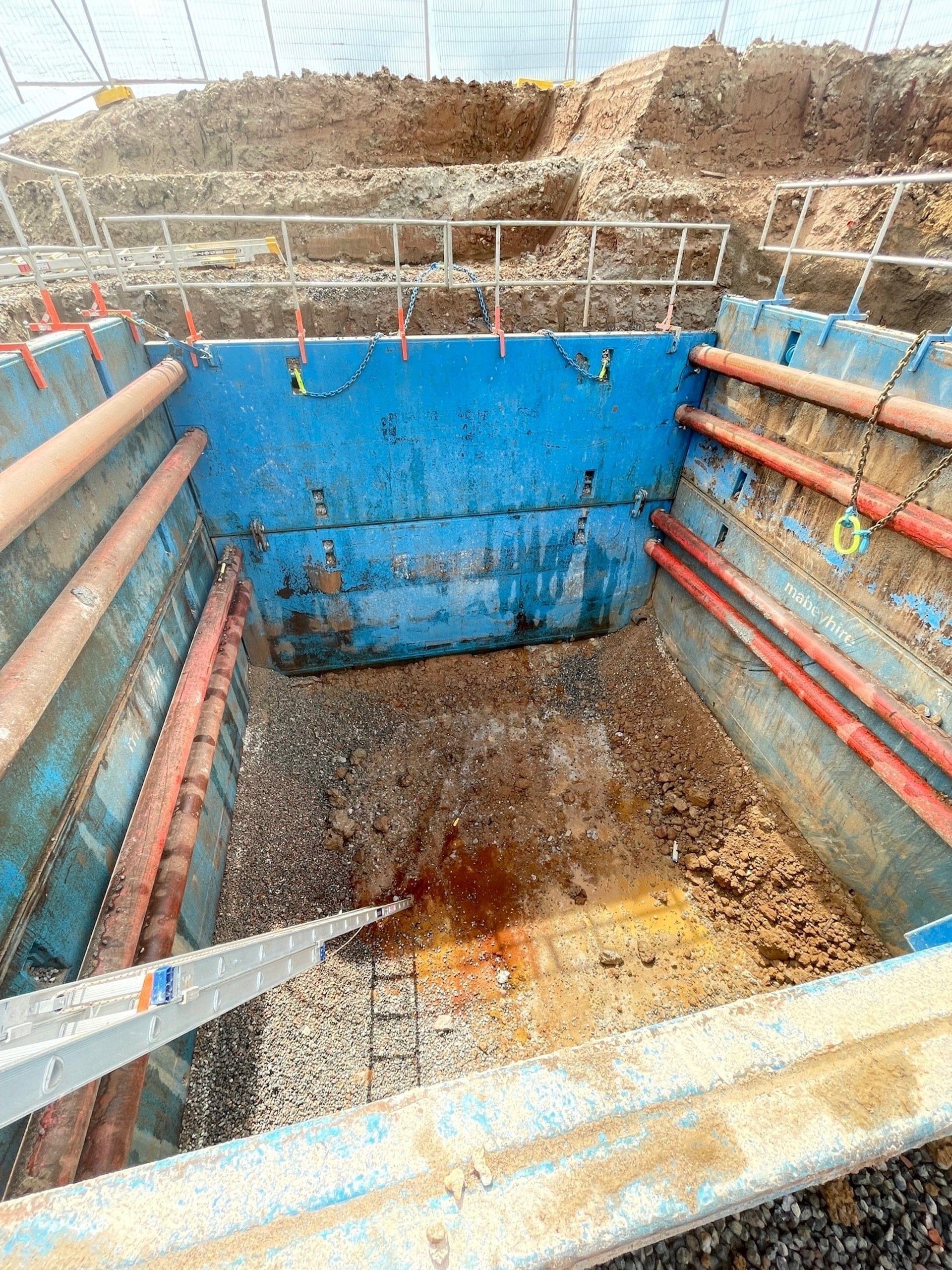 Close up of steel trench shield panels with reinforced double top and side rails for maximum strength